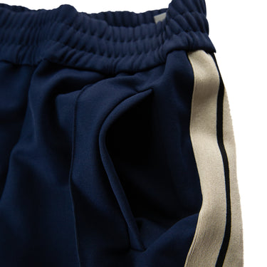 The waistband of the Palm Angels Navy Embroidered Logo Sweatpants.