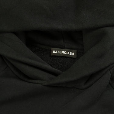 The inside label of the Balenciaga Mode Red & Black Hoodie.
