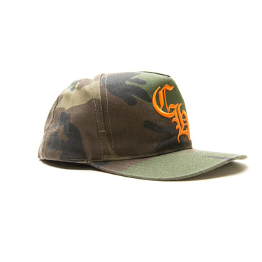 The side of the Chrome Hearts CH Camo Trucker Hat.