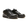 The front of the Dior B27 Low Black Patent Dior Oblique Trainers.
