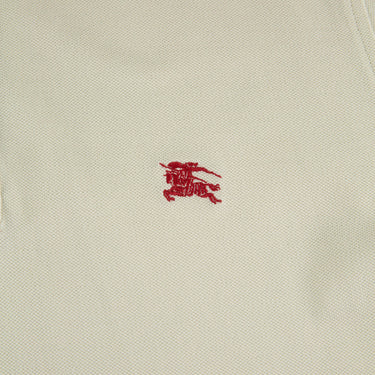 The logo of the Burberry Beige Polo Shirt.