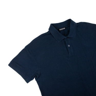 The flat lay of the Balenciaga Est. 1917 Navy Polo Shirt.