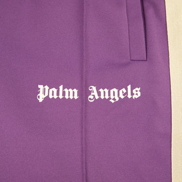 The logo of the Palm Angels Dark Purple Sweatpants L.