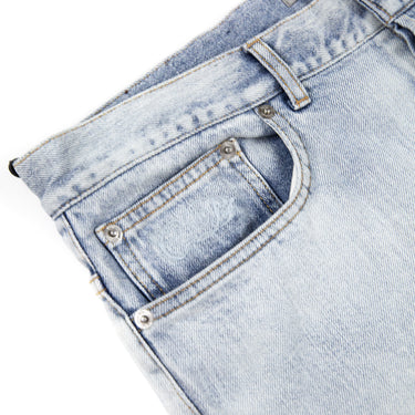 The band of Dior X Kenny Scharf Denim Jeans in blue.