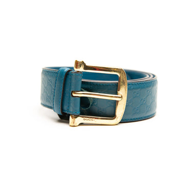 The front of the Gucci Blue Leather Embossed Monogram Gold Buckle Belt.