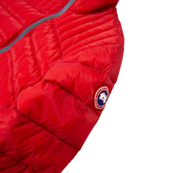 The side logo of the Canada Goose Brookvale Red Puffer Coat.