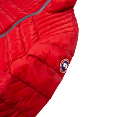 The side logo of the Canada Goose Brookvale Red Puffer Coat.