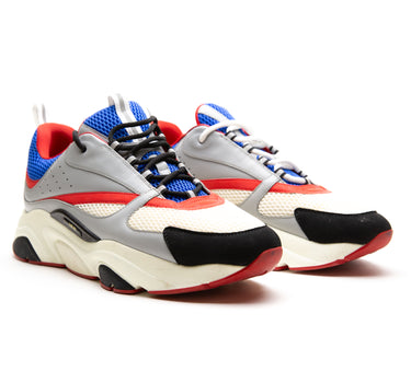 The front of the Dior Dior B22 Grey Red Blue Trainer.
