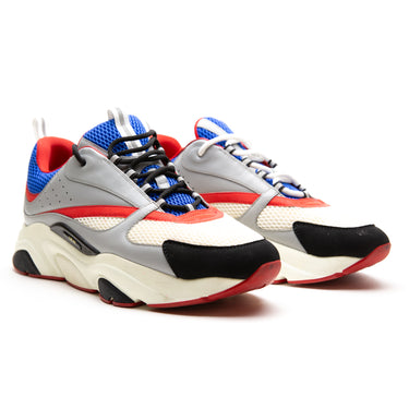 The front of the Dior Dior B22 Grey Red Blue Trainer.