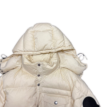 The hood of the Moncler Twist Huarez Cream Puffer Jacket.