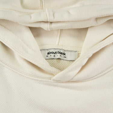 The inside label of the about:blank drop:seven White Hoodie.