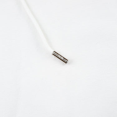 The logo of the Dior x Kaws Bee Embroidered White Hoodie.