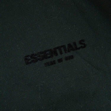 The logo of the Fear Of God ESSENTIALS Stretch Limo Hoodie S.