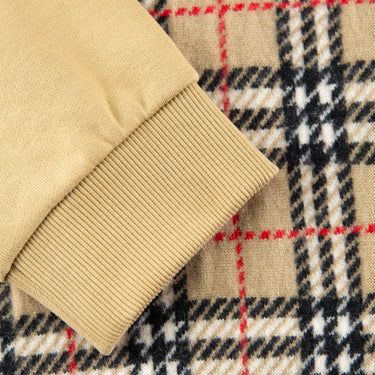 The sleeve of the Burberry Check Motif Applique Sweater.