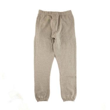 The back of the Fear Of God ESSENTIALS Dark Oatmeal Sweatpants S.