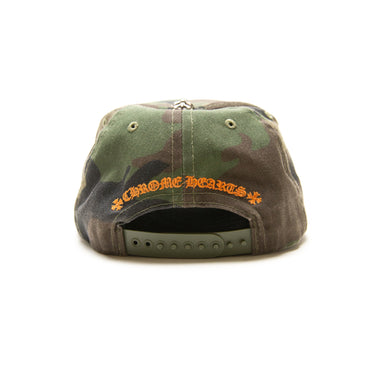 The side of the Chrome Hearts CH Camo Trucker Hat.