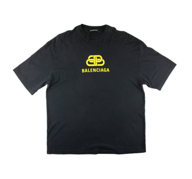 The front of the Balenciaga Yellow BB Logo Black T Shirt.