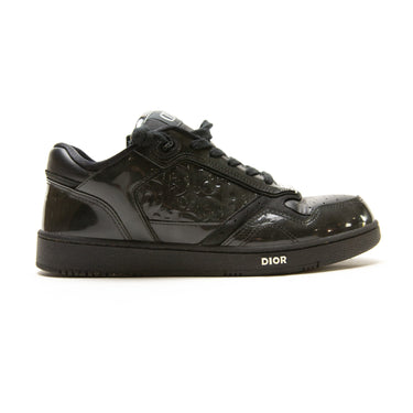 The side of the Dior B27 Low Black Patent Dior Oblique Trainers.