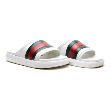 The side of the Gucci Web Rubber White Slide Sandals.