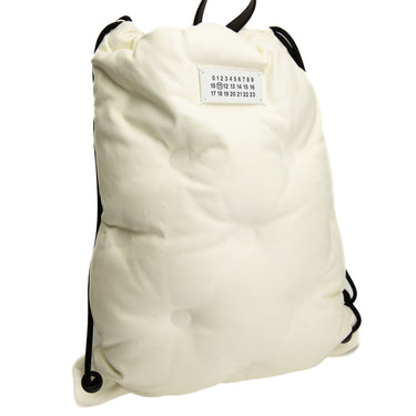 The side of the Maison Margiela Glam Slam Drawstring Backpack.