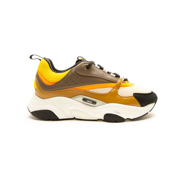 The right of the Dior B22 Ebony Camel Yellow Calfskin Trainer.