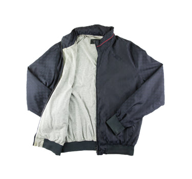 The inside  of the Gucci Navy Monogram Jacket.