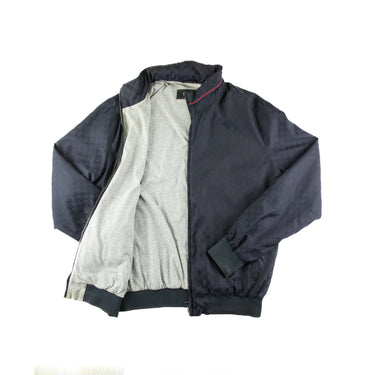 The inside  of the Gucci Navy Monogram Jacket.