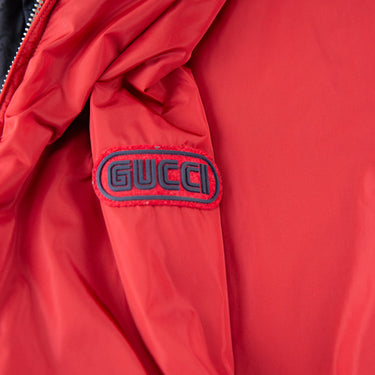The logo of the Gucci Monogram Reversible Bomber.
