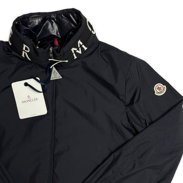 The logo of the Moncler Beid Navy Jacket.