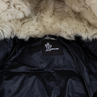 The inside label of the Moncler Grenoble Apres-Ski Shearling Jacket.