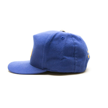 The left of the Chrome Hearts Blue Trucker Hat.