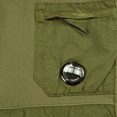 The logo of the C.P. Company Diagonal Fleece Mixed Lens Khaki Sweatpants.