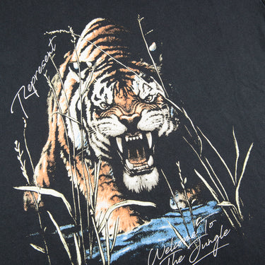 The logo of the Represent Welcome To The Jungle T Shirt.