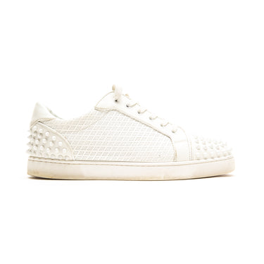 The right of the Christian Louboutin Seavaste 2 Orlato White Flat Trainers.