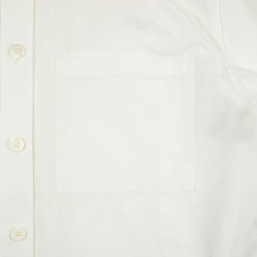 A close up of a part of the Burberry white button-up shirt.