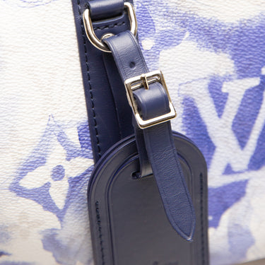 The logo of the Louis Vuitton City Keepall Monogram Watercolour Bag.