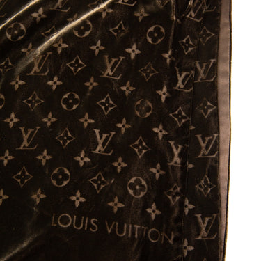 The logo detail of the Louis Vuitton Brown Velvet Monogram Scarf.