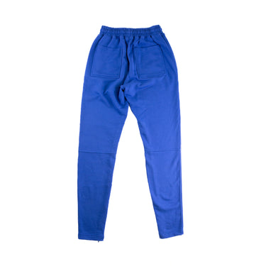 The back of the Represent Owners Club Blue Sweatpants.