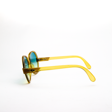Another side view of Dior 1980s 2214 Sunglasses in custom sky blue gradient.