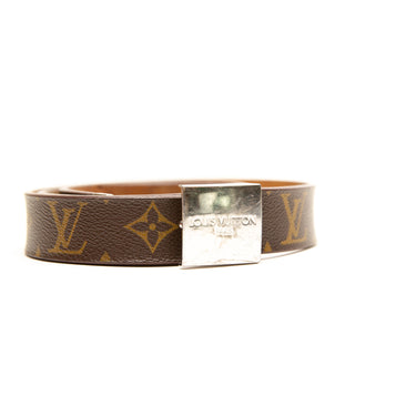 The buckle of the Louis Vuitton Monogram Square Buckle Belt.