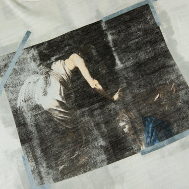 The logo of the Off-White Caravaggio White T Shirt.