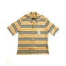 The front of the Burberry x Supreme Icon Silk Pajama Shirt Archive Beige.